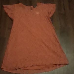 A burnt orange dress.